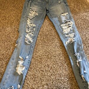 American Eagle Blue Jeggings with Distressed Detailing